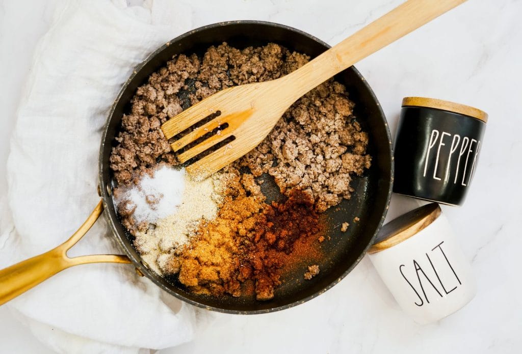 ground beef and spices in a pan