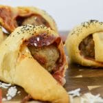 pepperoni meatball rollups on the counter