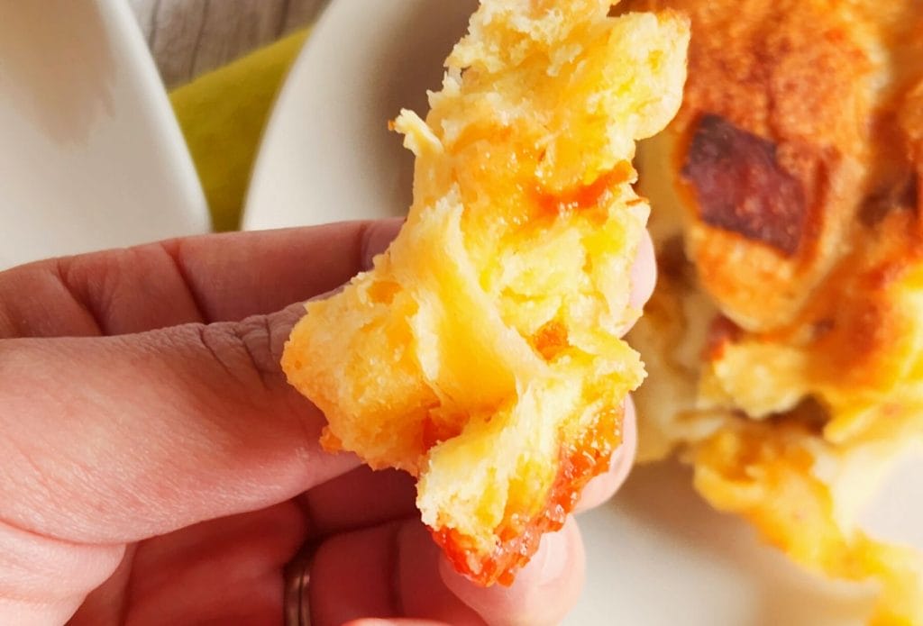 a pinch of pull apart bread in a hand