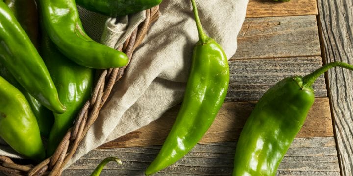 new mexican hatch chili peppers on a board