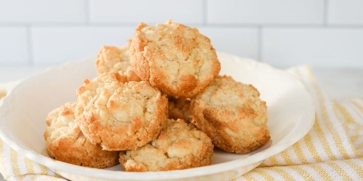 homemade sour cream biscuits on a white plate