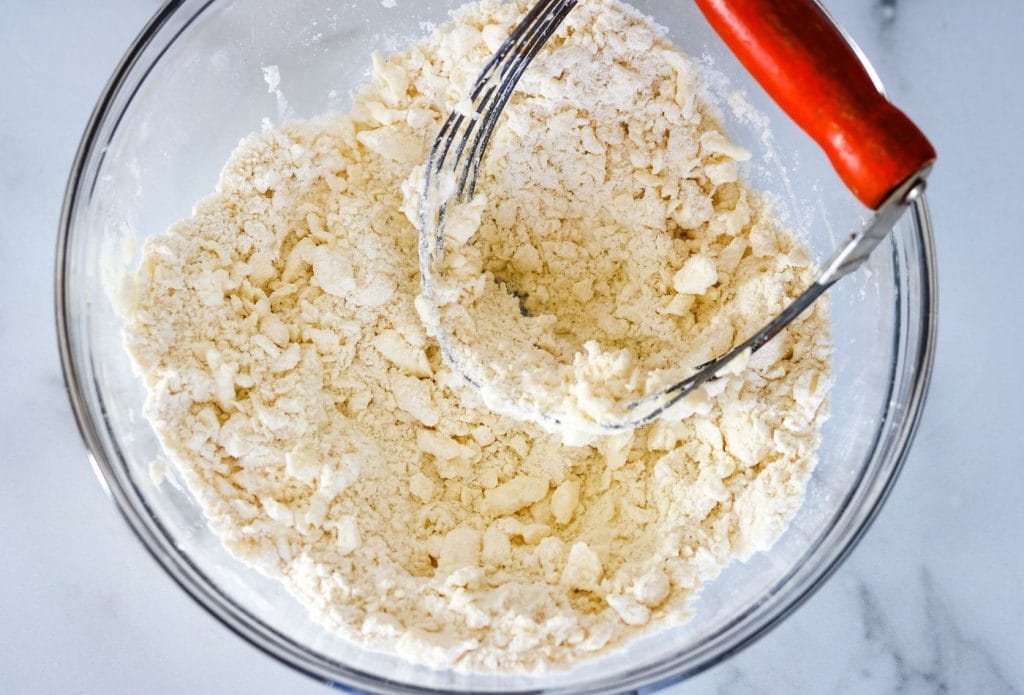 butter and flour cut into pea sized shapes with a pastry cutter