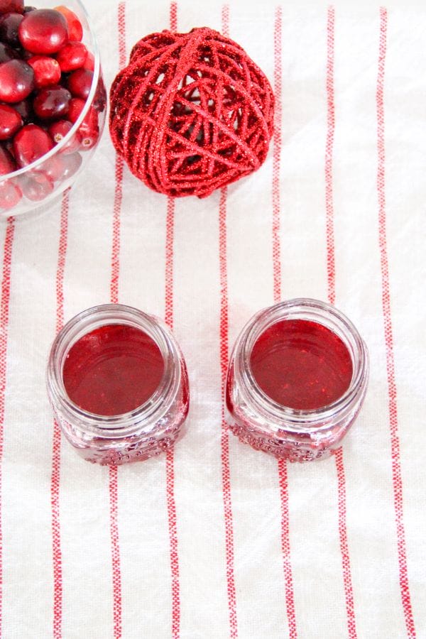 top view of two jars of cranberry syrup