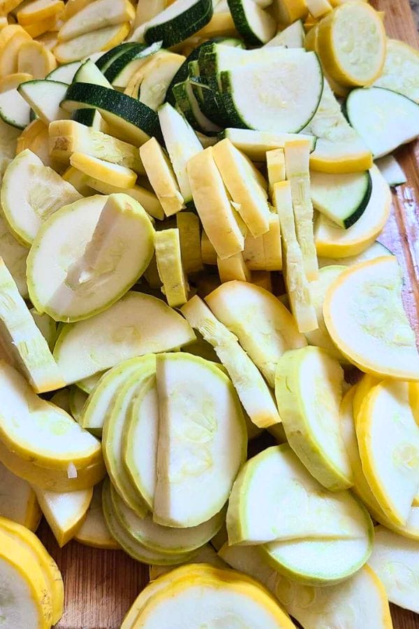 sliced summer squash on a cutting board