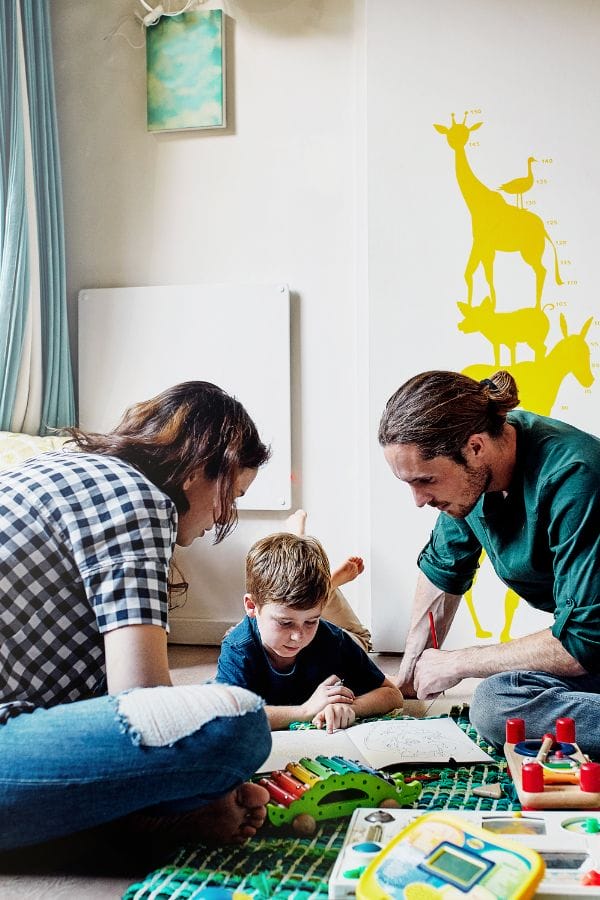 Parents and child doing a family engagement activity together