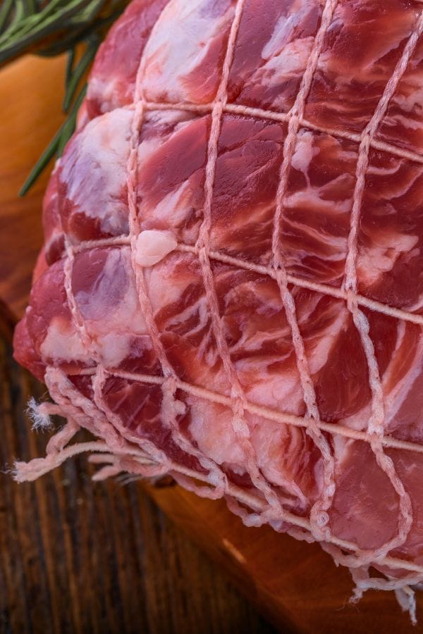 pork loin raw on a board