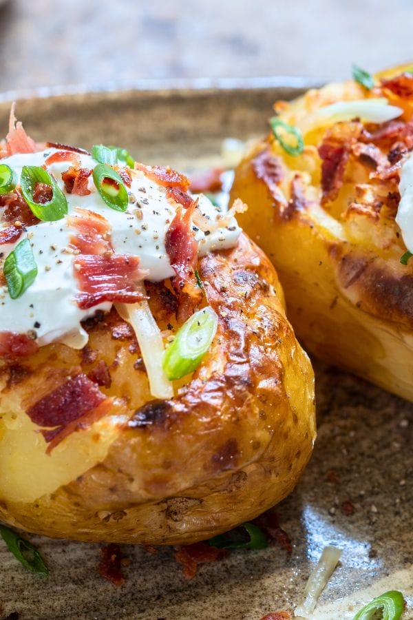 baked potatoes loaded with toppings