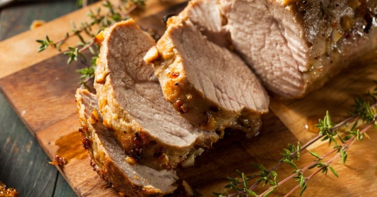 slices of pork tenderloin on a board