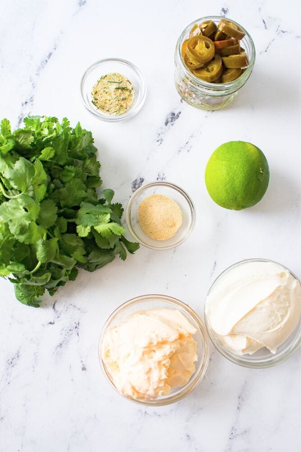 ingredients for ranch dressing on a board