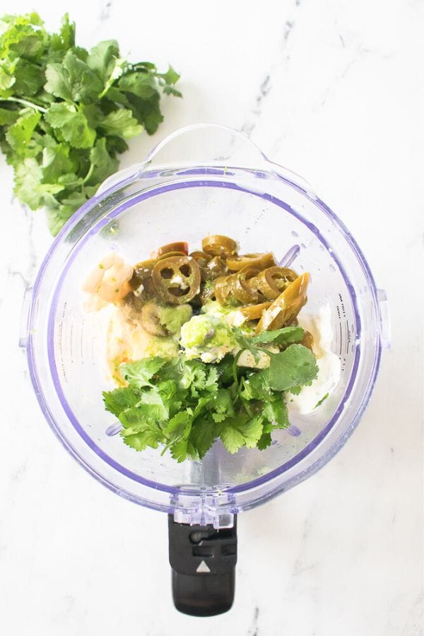 ingredients for cilantro lime ranch in a food processor