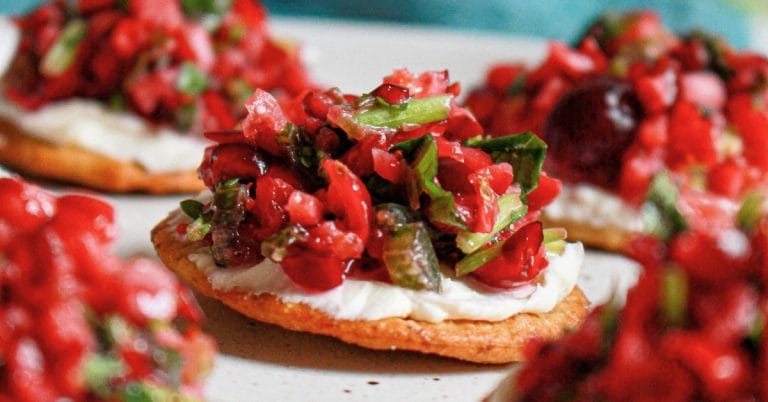 cranberry salsa spread on crostini