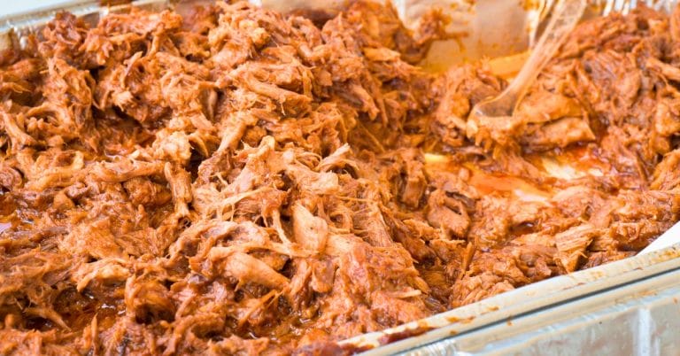 a big pan of leftover pork roast in a pan