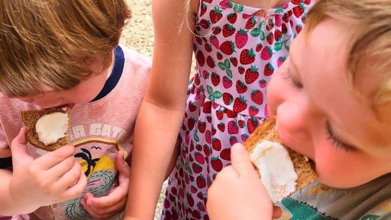 kids tasting homemade butter they just made