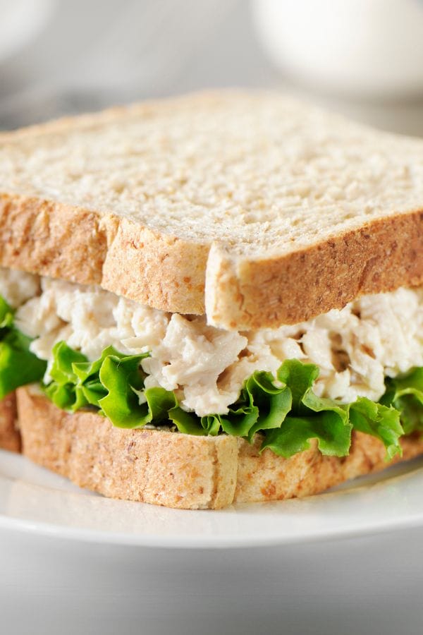 a fresh tuna sandwich on a plate