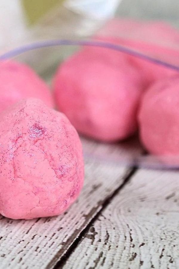 balls of homemade playdough on a table
