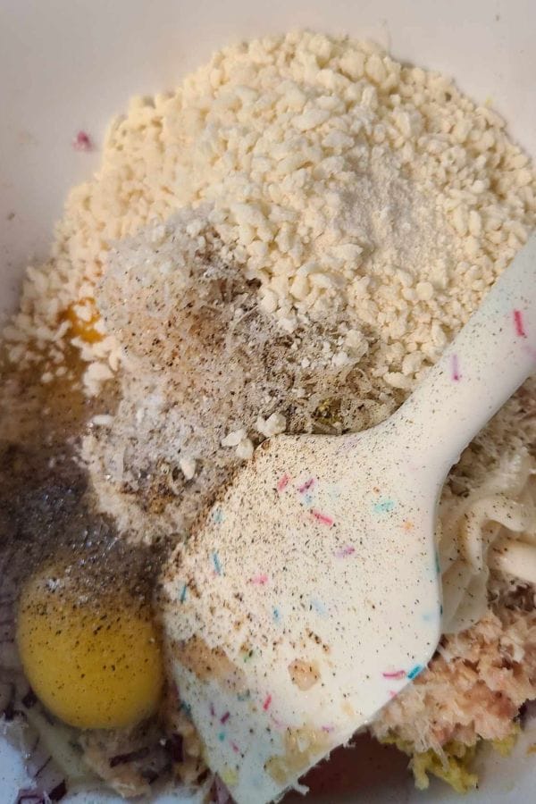 the ingredients for tuna fritters in a bowl