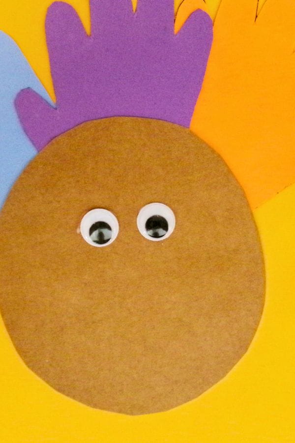 googly eyes going on a paper turkey