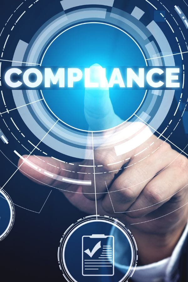 A person’s finger touches a virtual interface with the word “COMPLIANCE,” icons of documents and checklists, highlighting adherence to Oklahoma daycare licensing regulations.